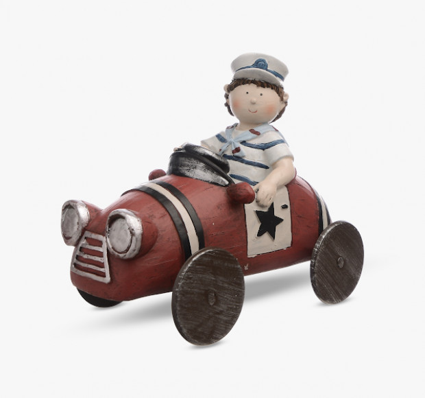 Статуэтка Мальчик в тельняшке на машине